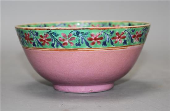 A Chinese pink ground porcelain bowl made for the Islamic market, Jiaqing period, with inscription to the interior, width 13.75cm
